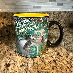 Curious and Curiouser Cheshire Cat Graphic Mug - Yellow Interior